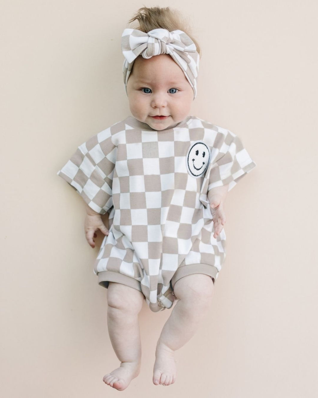 Short Sleeve Bubble Romper | Checkered Smiley Latte (LPK)